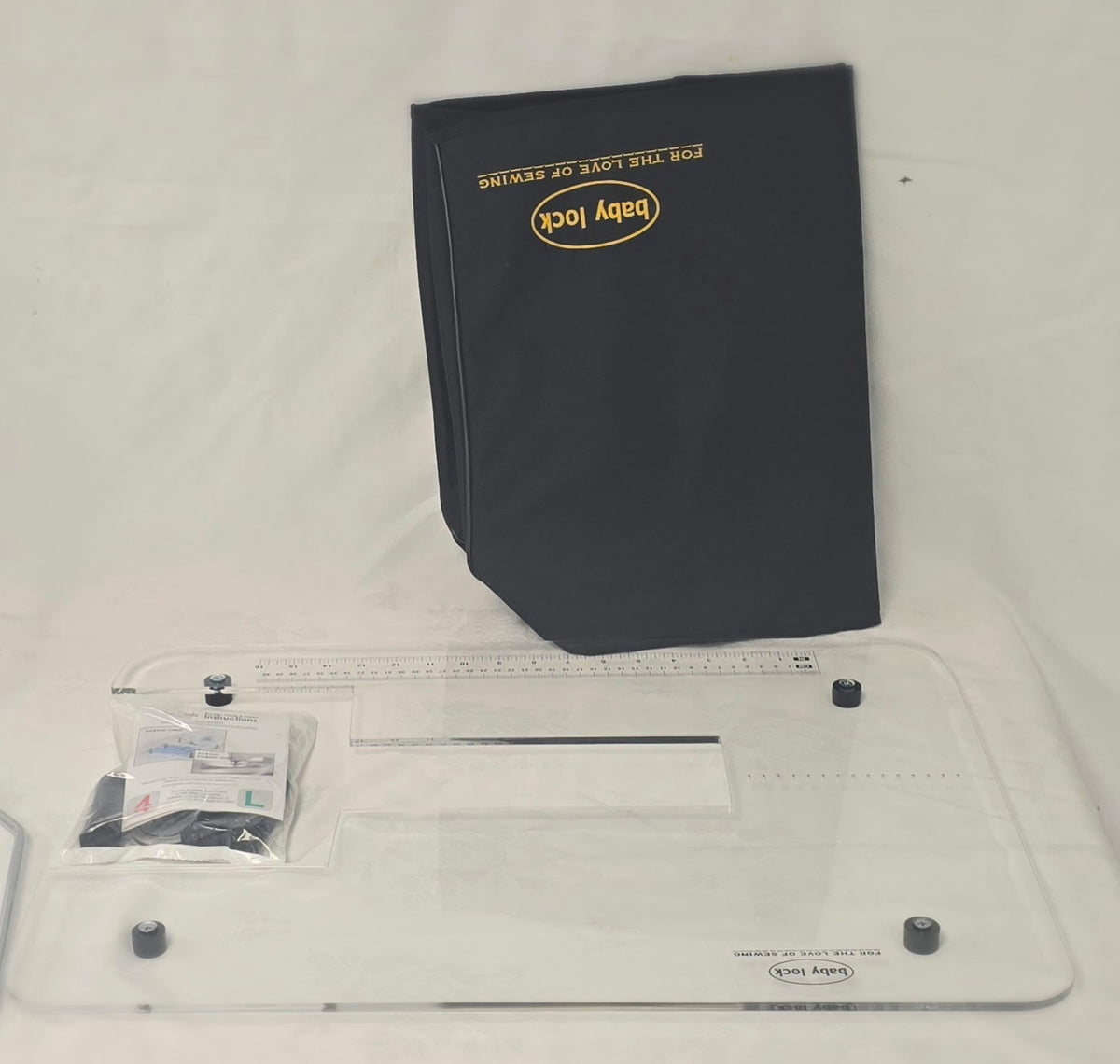 Pre-owned Baby Lock Jazz II – extension table and dust cover