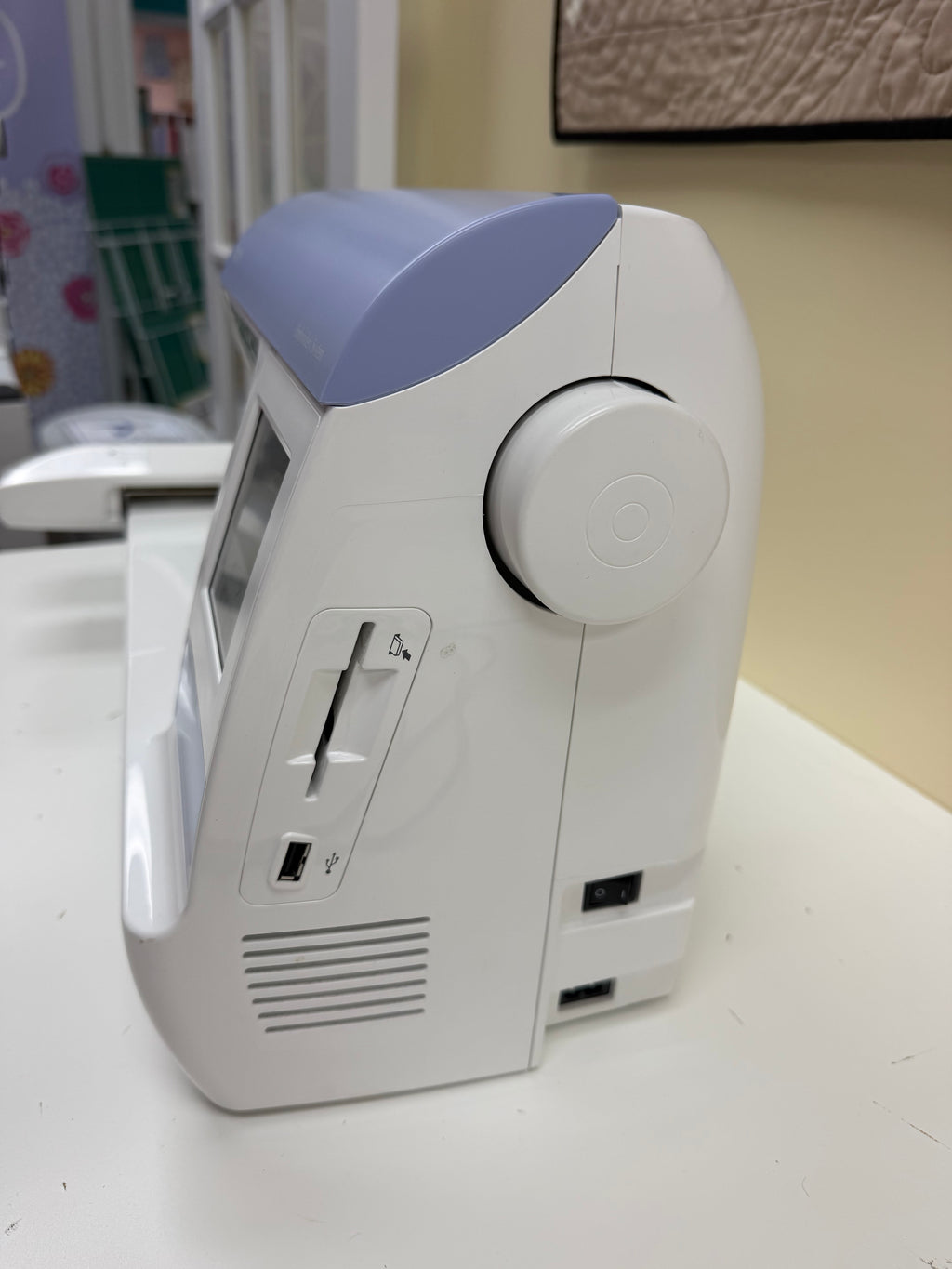 Brother PE770 side view showing USB port and memory card slot
