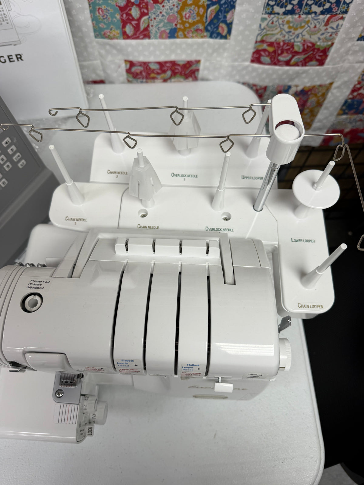 Pre-owned Baby Lock Evolution BLE8W-2 – top view with thread stand